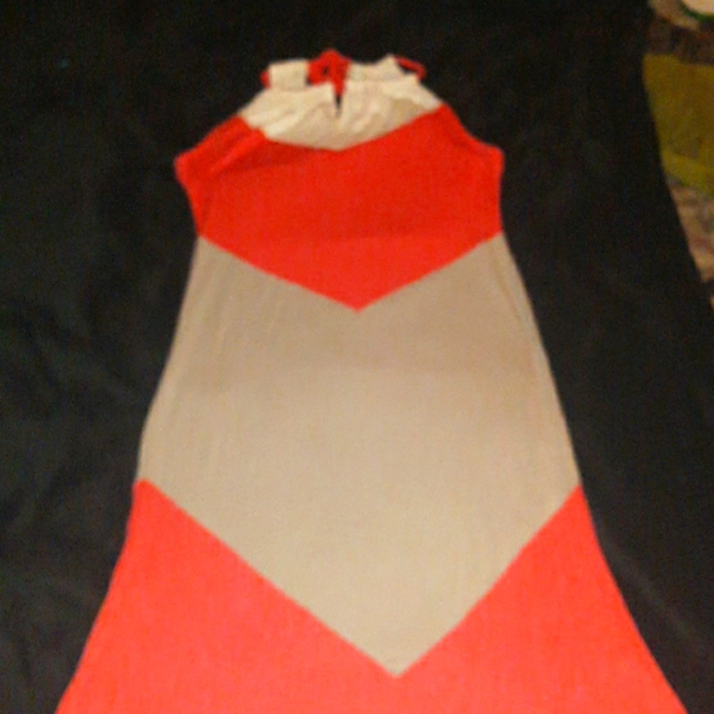 Long diamond colored form fitting sleeveless dress